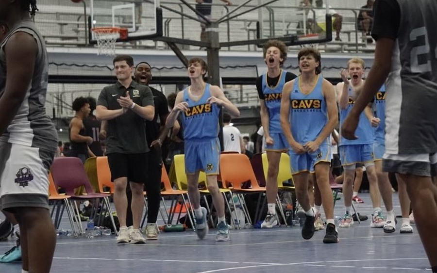 NOVA CAVS players and coaches celebrating during a game